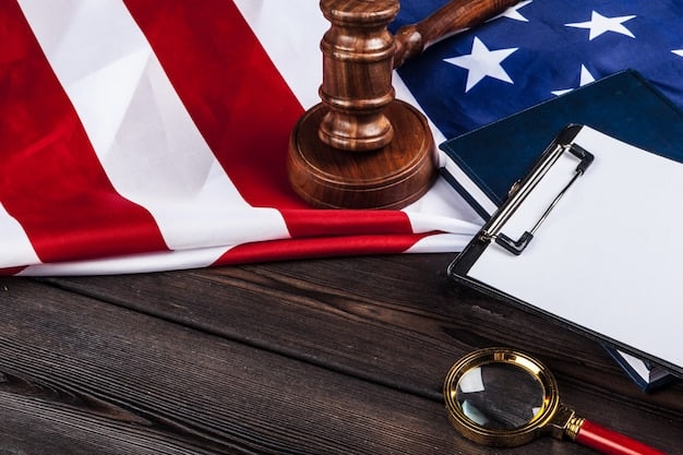 A gavel resting on a stack of legal documents with the US flag subtly visible in the background. The image conveys the authority and importance of legal compliance for businesses operating in the United States.