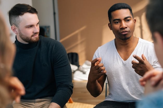 Two co-founders participating in a mediation session, with a neutral mediator facilitating the conversation. They are listening attentively to each other.