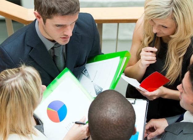 A group of analysts meticulously reviewing startup financial documents in a corporate office. The scene conveys the importance of in-depth analysis and scrutiny during the due diligence process.