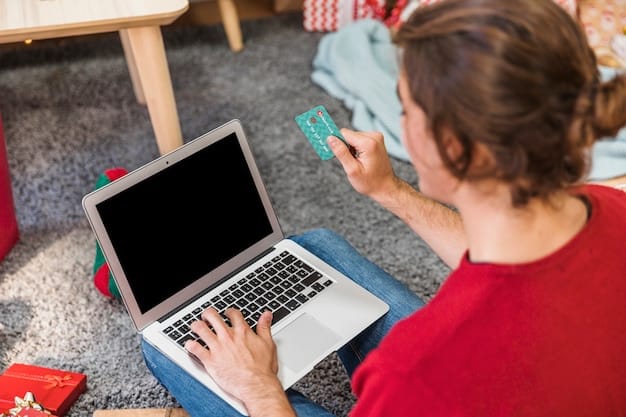 A person using a laptop to compare different credit card offers on a financial website. The screen shows various credit card details, and the person is taking notes, highlighting careful comparison and decision-making.