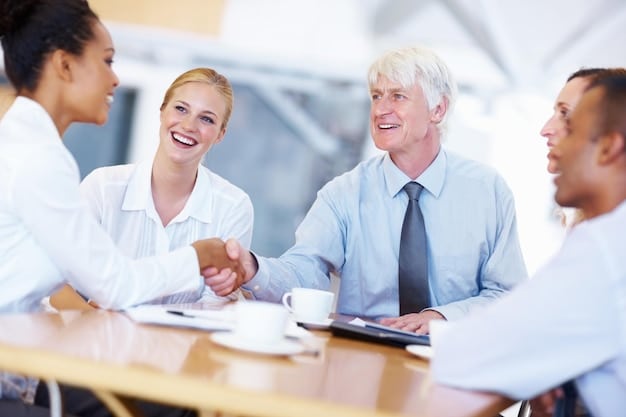 A group of business professionals shaking hands over a table, symbolizing a successful equity financing deal. There are tablets and financial charts on the table, indicating discussion of growth prospects.