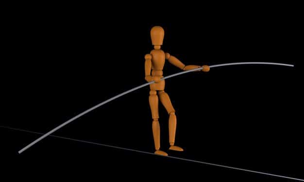 A visual metaphor of a tightrope walker (startup) balancing on a thin line with economic indicators (interest rates, inflation) in the background.