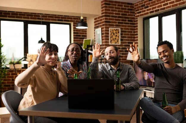A diverse team of startup employees celebrating a successful milestone, high-fiving and smiling in a modern office, representing positive outcomes and team spirit after securing investment.
