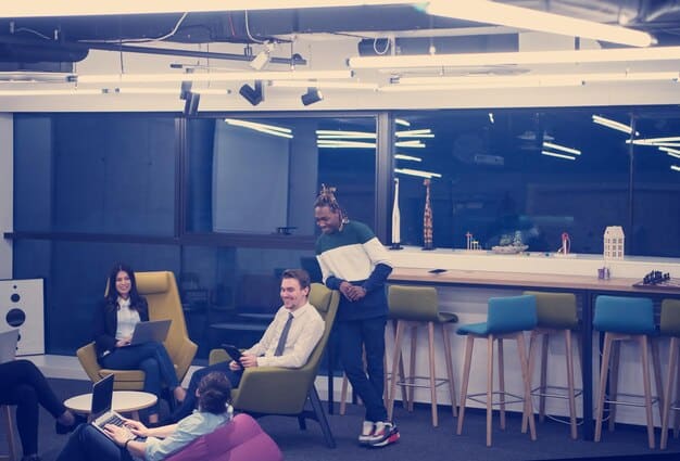 A diverse group of young entrepreneurs engaged in a dynamic brainstorming session, illustrating collaborative problem-solving and innovation in a modern office space.