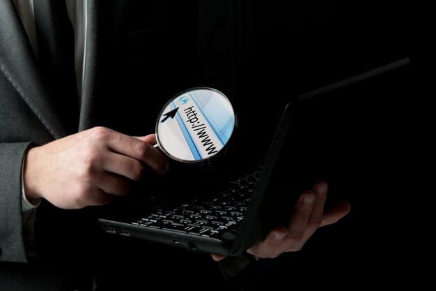 A person holding a magnifying glass over a laptop screen displaying sales figures and a checklist, symbolizing meticulous compliance review and strategic planning.