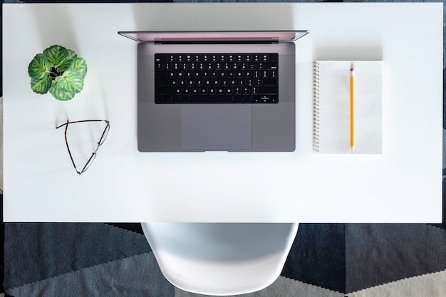 A minimalist office space with a single laptop on a desk, representing the lower overhead costs associated with remote-first startups. The image conveys efficiency and a focus on digital infrastructure.