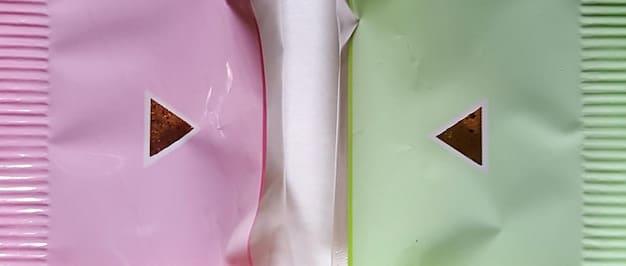 A Split screen shows two different approaches to packaging: On one side, traditional plastic packaging, and on the other, EcoLife Innovations' biodegradable and compostable packaging. The images highlight the importance of sustainable business practices and explain how they contribute to US Startup Success Stories: Lessons Learned from Companies That Thrived in 2024.