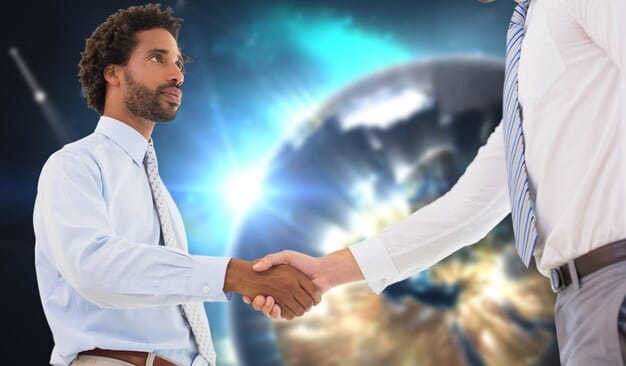 A startup founder shaking hands with an angel investor after a successful pitch. Both are smiling and the atmosphere exudes enthusiasm and confidence, symbolizing the beginning of a promising collaboration within angel investor networks in the US: finding the right funding partner for your startup.