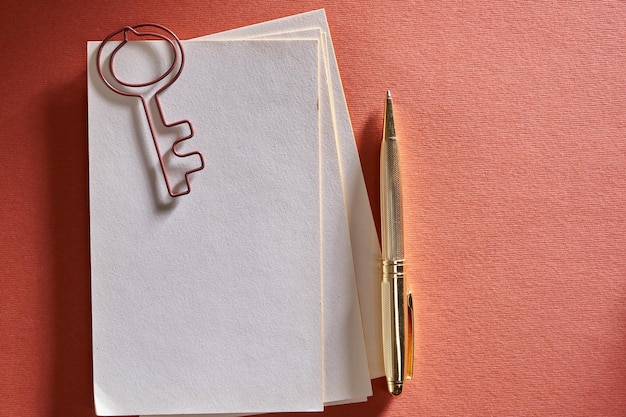 A close-up shot of an open Franchise Disclosure Document (FDD) with highlighted sections, emphasizing key financial figures and legal terms. A pen rests on the document, suggesting careful review. The lighting is bright and focused on the FDD details.