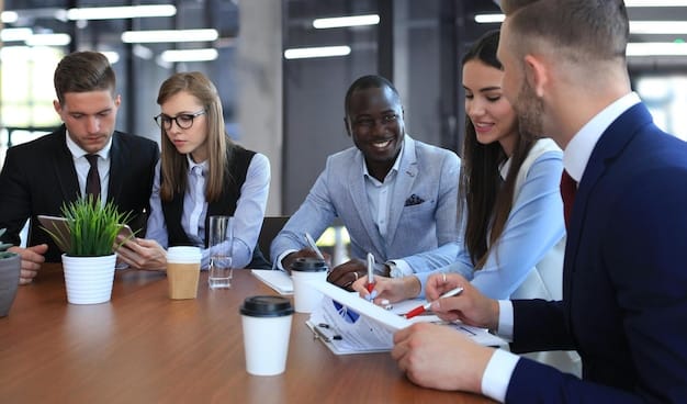 A diverse group of business professionals in a boardroom discussing complex legal documents, emphasizing the collaborative effort needed for compliance.